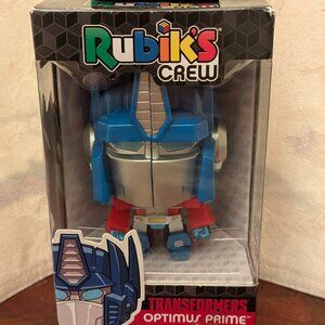 New in box Hasbro Rubik's Crew Optimus Prime Puzzlehead Collectible